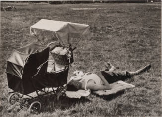 Wimbledon Common, London (Man lying down with pram)