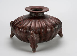 Gadrooned vessel with tripod parrot feet