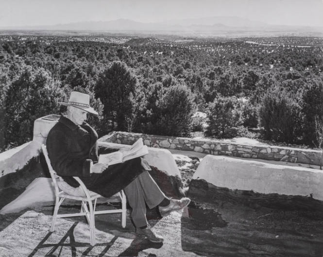 Santa Fe Essay: Musgrave reading newspaper