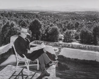 Santa Fe Essay: Musgrave reading newspaper