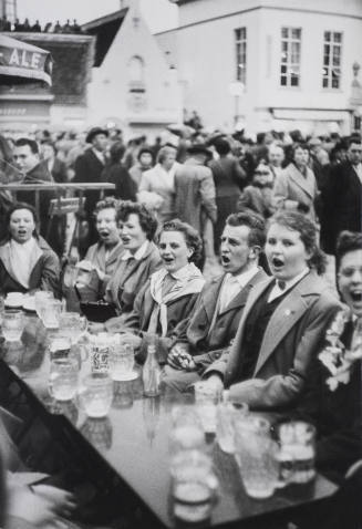 Group of people singing and drinking beer, Brussels World Fair