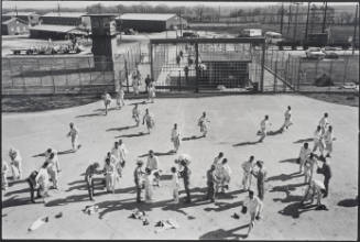 Return from the fields, shakedown at the rear gate. Twice every work day, from Conversations with the Dead: Photographs of Prison Life with the Letters of of Billy McCune #122054, 1971