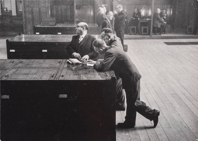 Men doing business in the grain exchange, Amsterdam, Holland