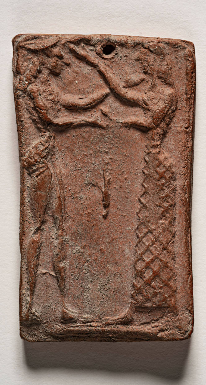 Plaque depicting two standing figures facing inwards (Theseus and Ariadne?)
