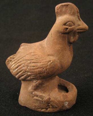 Lamp surmounted by a partridge