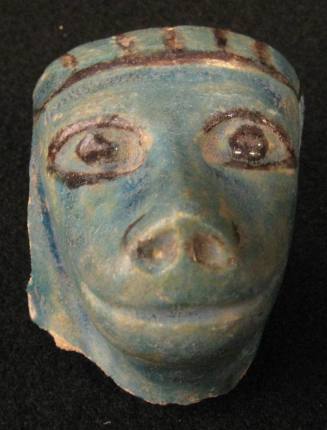 Fragment in form of baboon's head from Abydos (?)