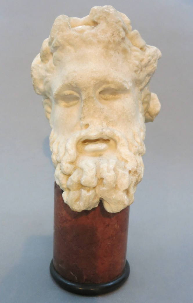 Bearded head of a god
