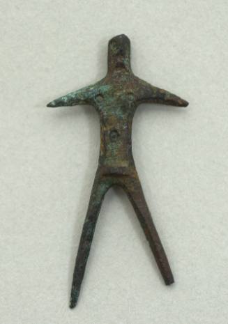 Statuette of a stylized standing figure with arms extended