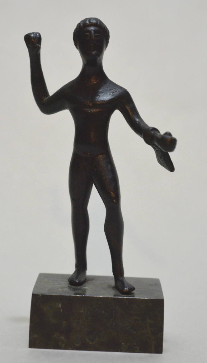 Hercules leaping forward onto his left leg with lion skin over his left arm