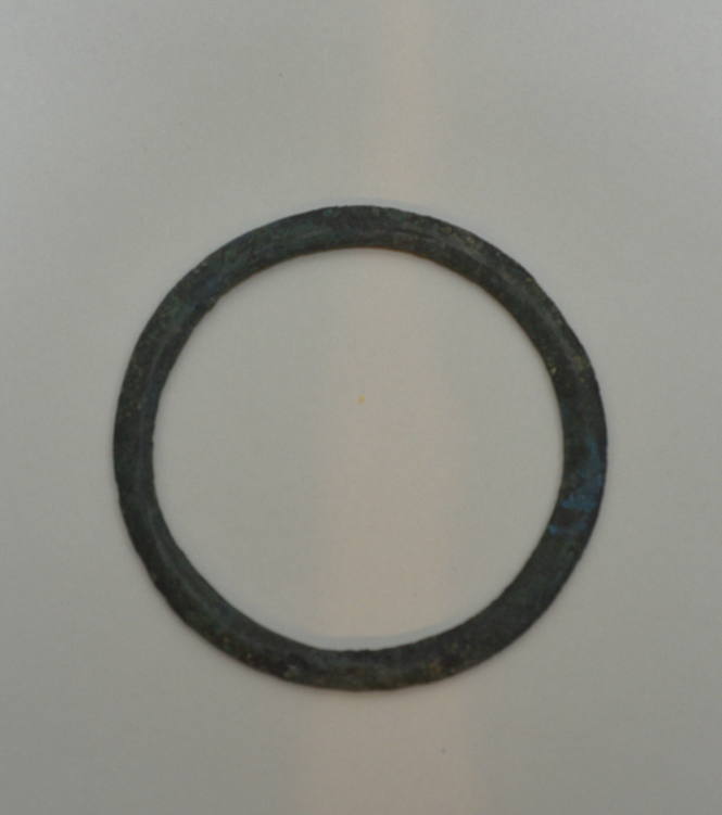 Large ring with faint incised zig-zag decoration