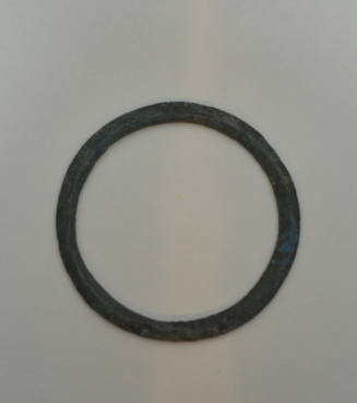 Large ring with faint incised zig-zag decoration