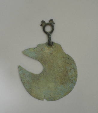 Lunate razor with handle ornamented with two birds' heads