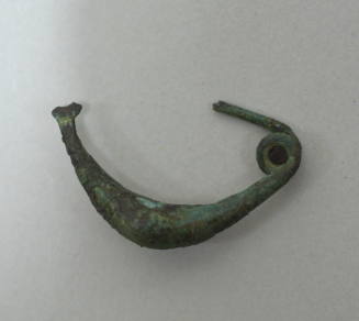 Fibula "a sanguisuga" with incised furrows across bow, triple spiral spring