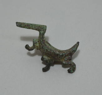 Fibula "a sanguisuga," bow ornamented with incised lines and three attachments