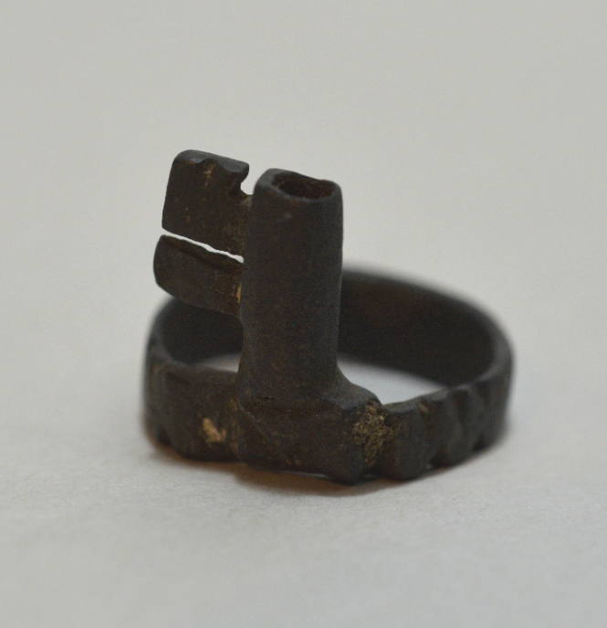 Finger ring with decoration of small key