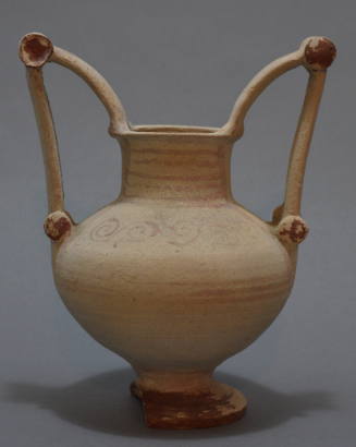 Apulian "Trozella." with high angular handles with rotells, and spiral ornament on shoulder