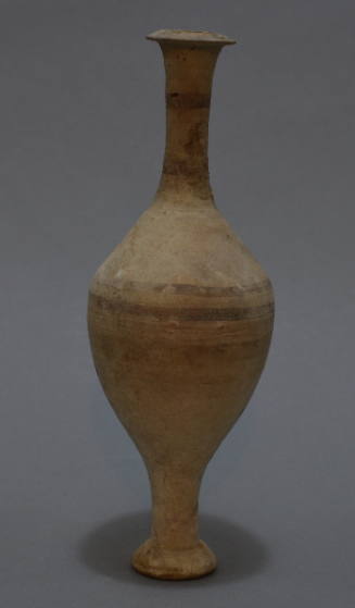Footed alabastron (spindle -shaped), with traces of linear ornament on buff ground