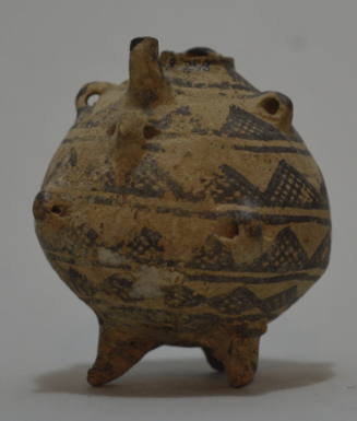 Cypriot buffware vessel with projecting lugs, decorated with cross-hatched geometric designs