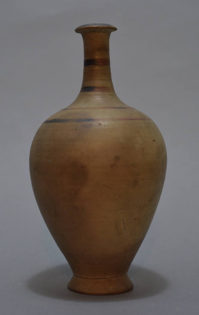 Pottery bottle of ovoid form, tapering to slender neck, with four painted bands at neck and shoulder