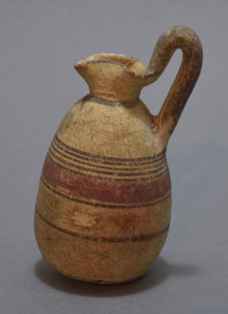 Cypriot oinochoe with pinched spout (trefoil lip) and encircling bands in red and brown paint