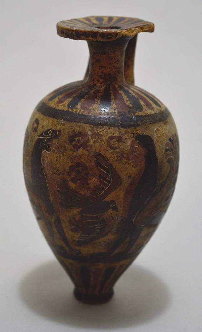 Italo-Corinthian pointed aryballos, painted with a lion, a sphinx, a bird, and a siren; rosettes and rays