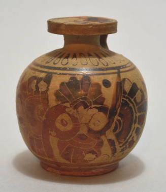 Italo-Corinthian globular aryballos decorated with a duck and a swan flanking a quatrefoil palmette
