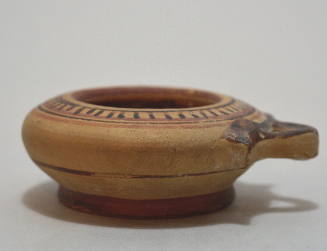 Corinthian bowl or Kothon with rays painted on rim; lateral handle