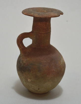 Small redware handle-ridge jug with broad rim