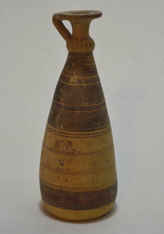 Italo-Corinthian pottery alabastron of conical form; with encircling bands