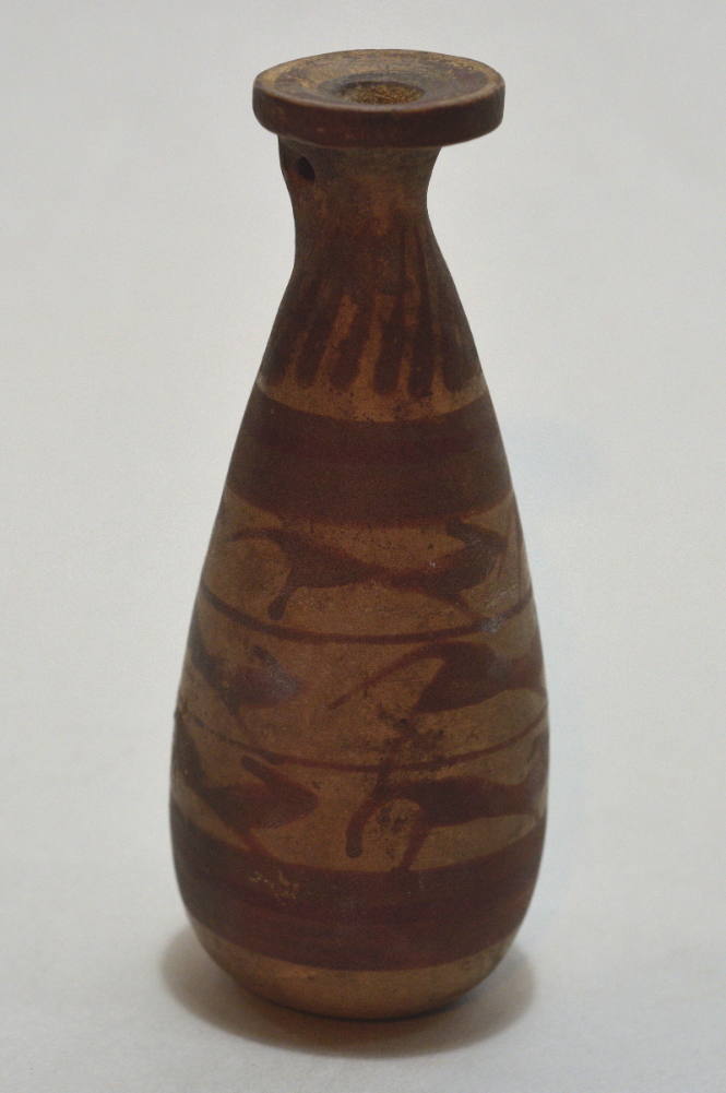 Italo-Corinthian sack alabastron decorated with three friezs of stylized running animals
