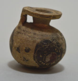 Italo-Corinthian round aryballos decorated with circualr motifs-shields