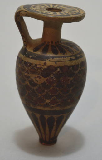 Italo-Corinthian pointed aryballos decorated with scale decoration rays on base and shoulder with zig-zag on handle