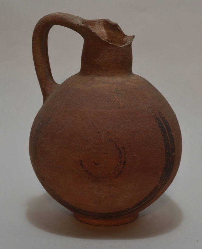Cypriot oinochoe with trefoil lop redware, with black painted circles