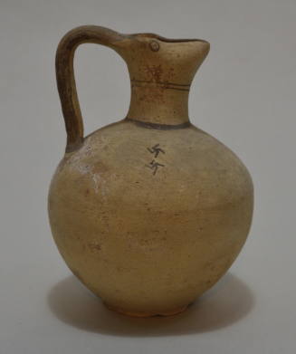 Cypriot oinochoe with trefoil lip, globular body; buffware, with eyes on spout and swastikas on shoulder