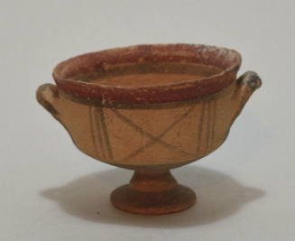 Cypriot Kylix with lateral handles, red and brown decoration, brown 'x' in the field