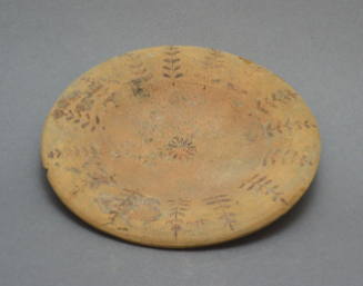 Plate; white-painted ware, ornament with radically-placed leaf design