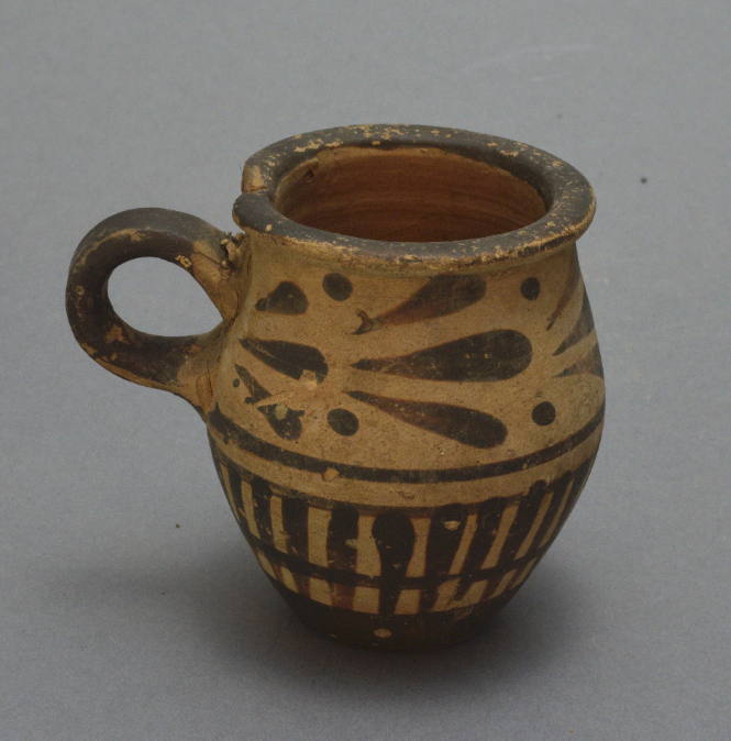 Small jug with leaf ornament