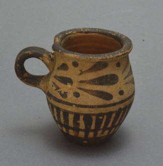 Small jug with leaf ornament