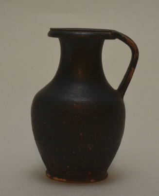 Black-glazed, olpe with everted rim and ribbed handle