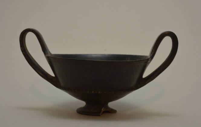 Etruscan bucchero kantharos, two igh handles; notched ridge on exterior