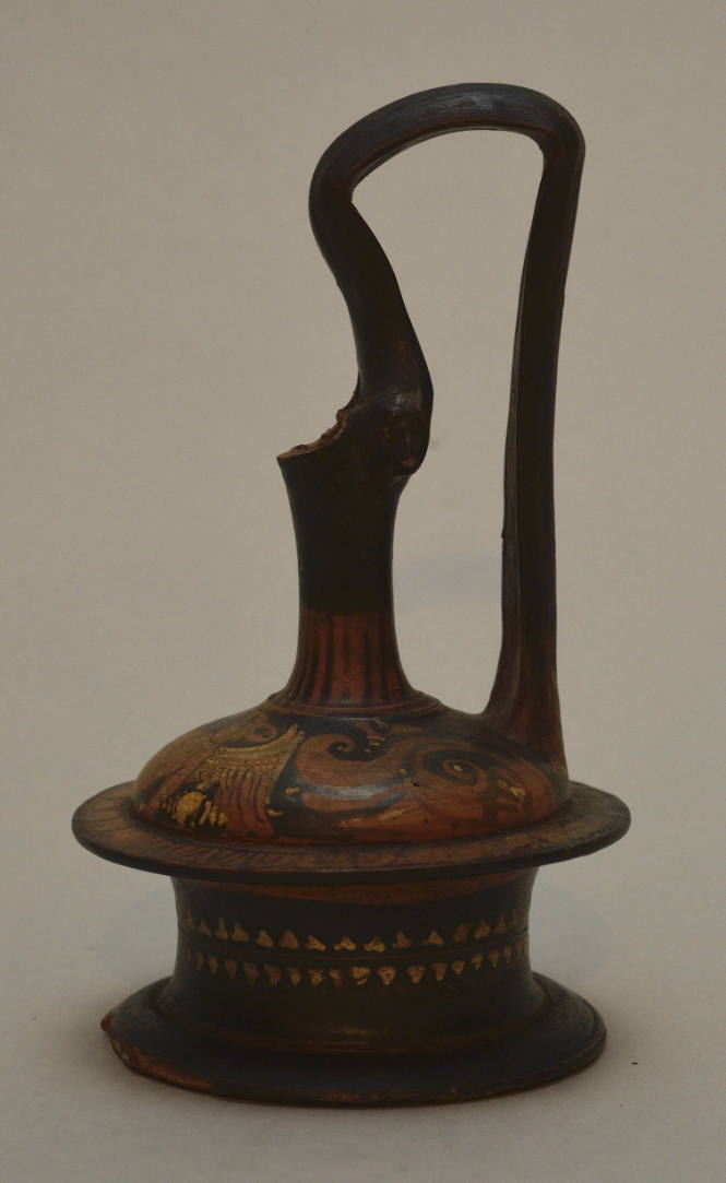 Apulian red-figure epichysis; with high handle; shoulder painted with seated figure of Eros