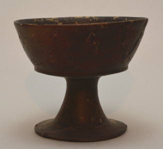 Etruscan bucchero chalice cup on high foot, with incised palmette festoon pattern