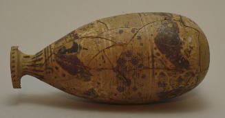 Italo-Corinthian or Proto-Corinthian sack alabastron, with friezes of birds, goats and lions, and band of scale pattern