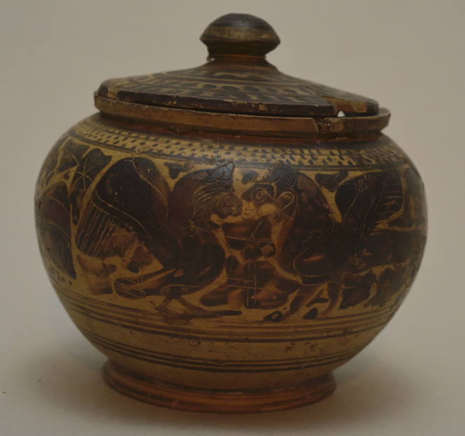 Corinthian lidded pyxix; decorated with a frieze of lions and lion-headed birds