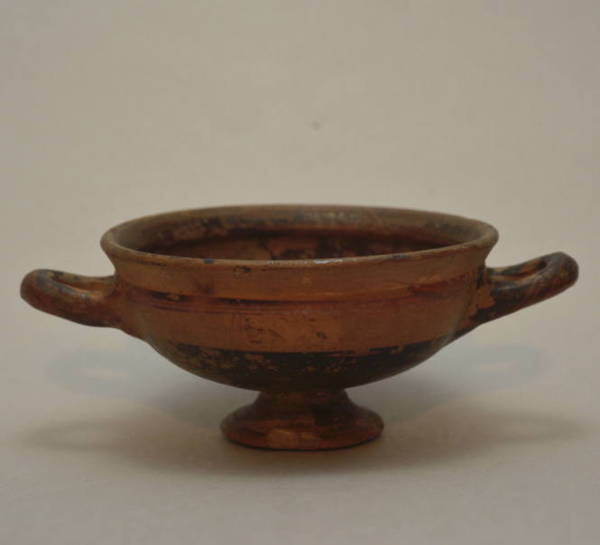 Kylix with foot, ornamented with reserved band beneath the rim on the interior
