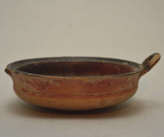Fragmentary kylix, black-glazed interior, reserved exterior