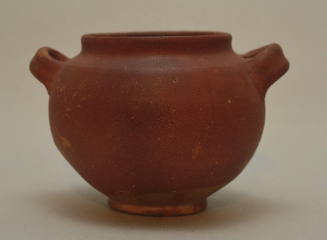 Red-glazed Samian buffware jar