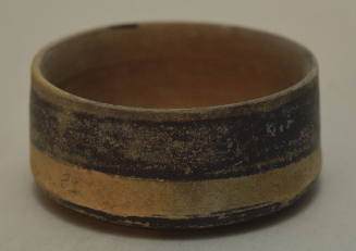 Corinthian pottery lid, painted with black encircling bands