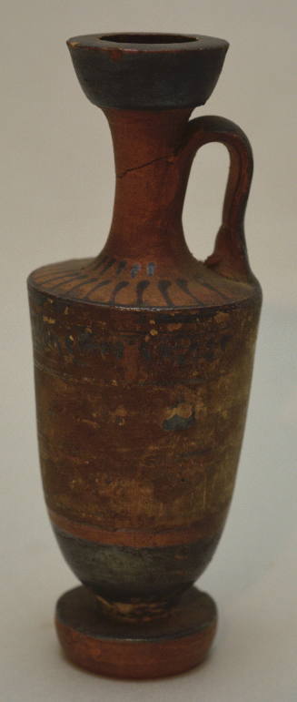 Attic black-figure lekythos ornamented with ivy wreath and crowwbar; rays on shoulder