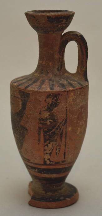 Black-figure lekythos, painted with weated Diontsus flanked by two draped figures